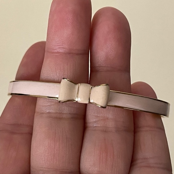 Kate Spade pink enamel, gold plated metal bow bangle bracelet - Picture 1 of 6